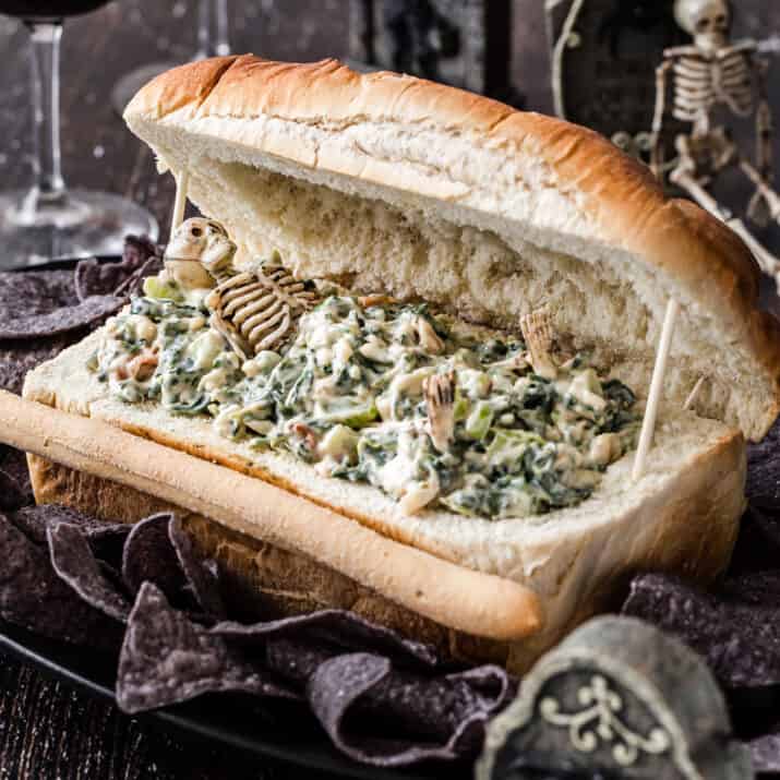spinach dip in bread bowl shaped like a coffin