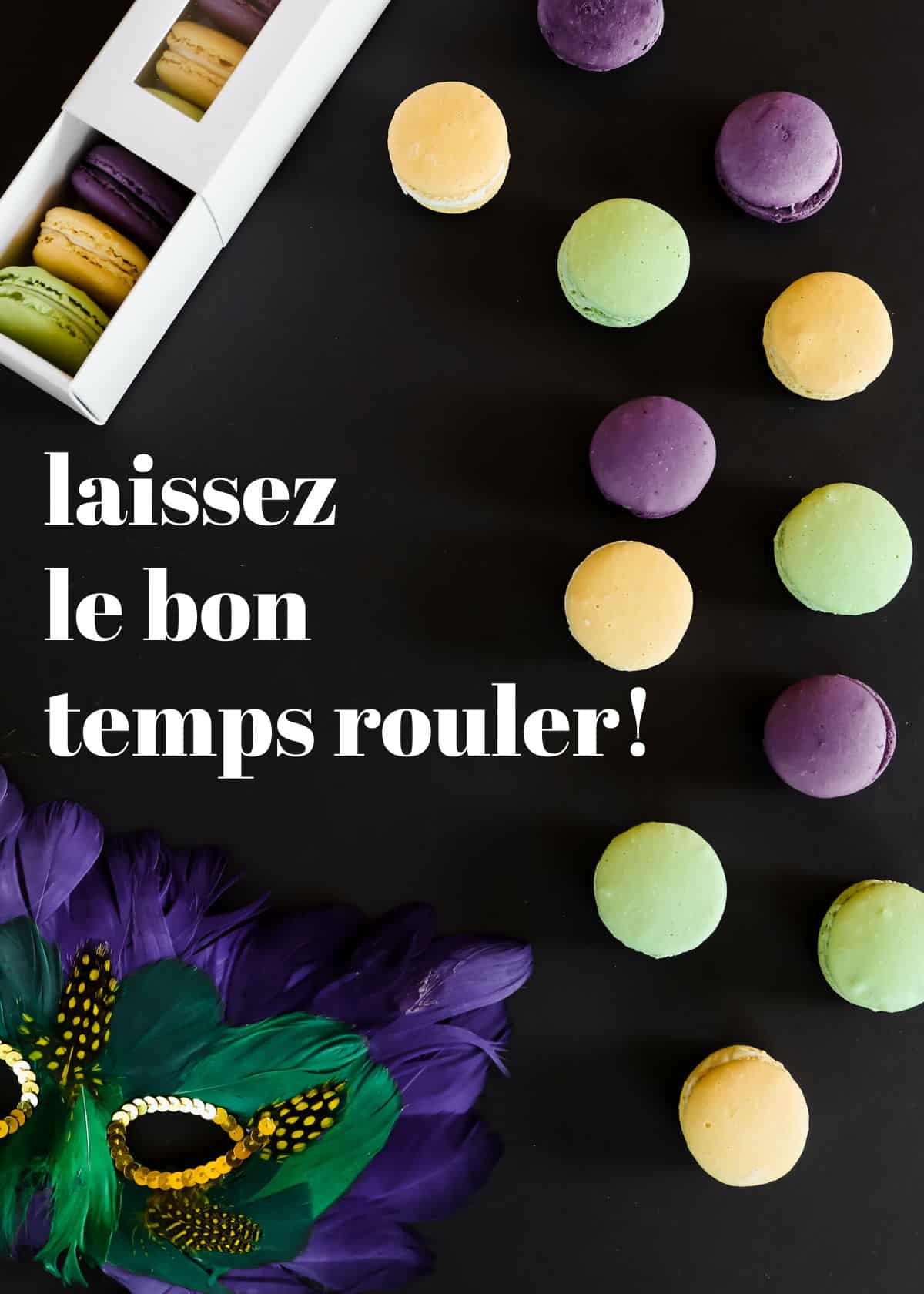 black background with macarons and mardi gras mask and text says laissez le bon temps rouler!