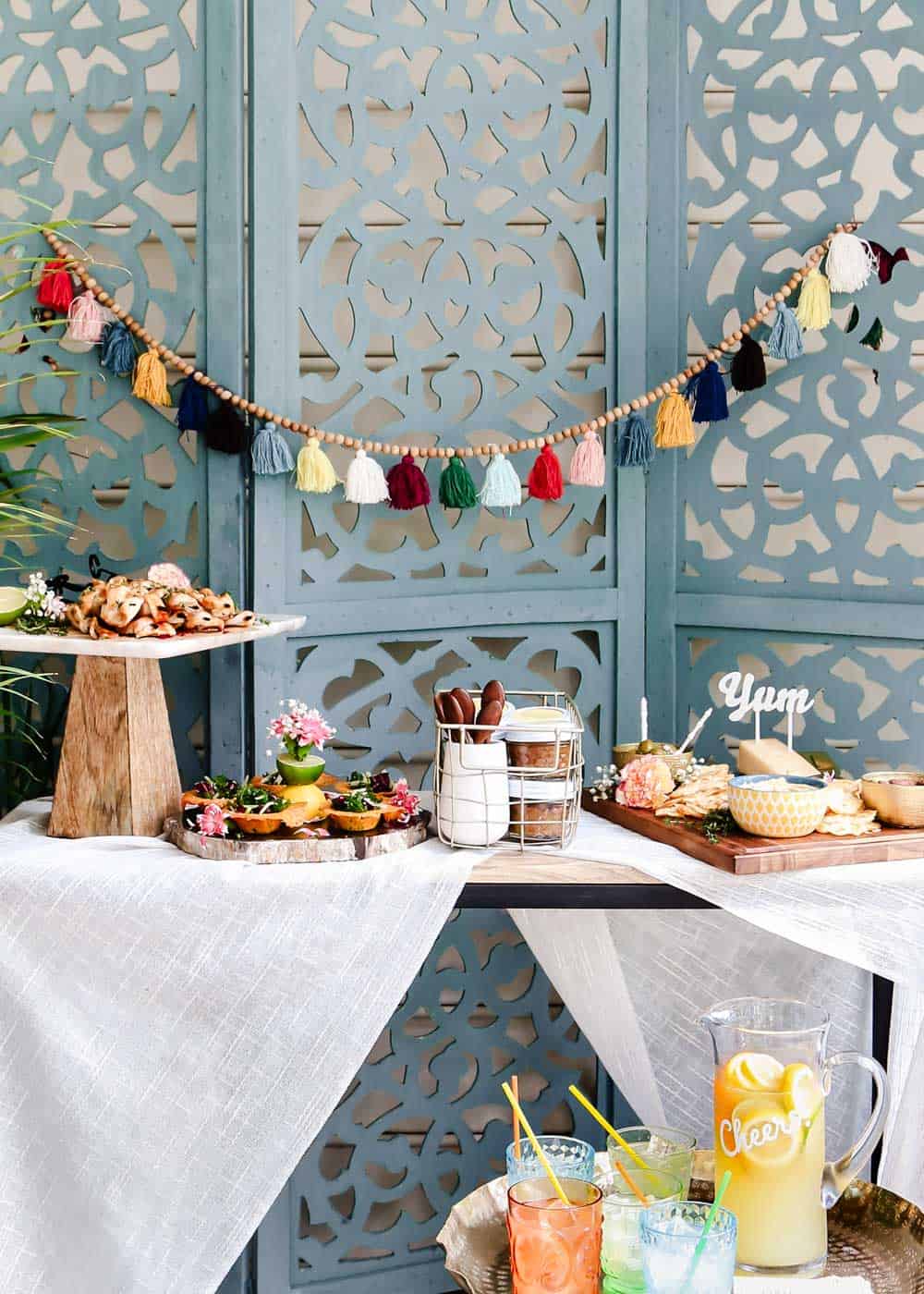 Outside summer party food buffet with blue screen background.