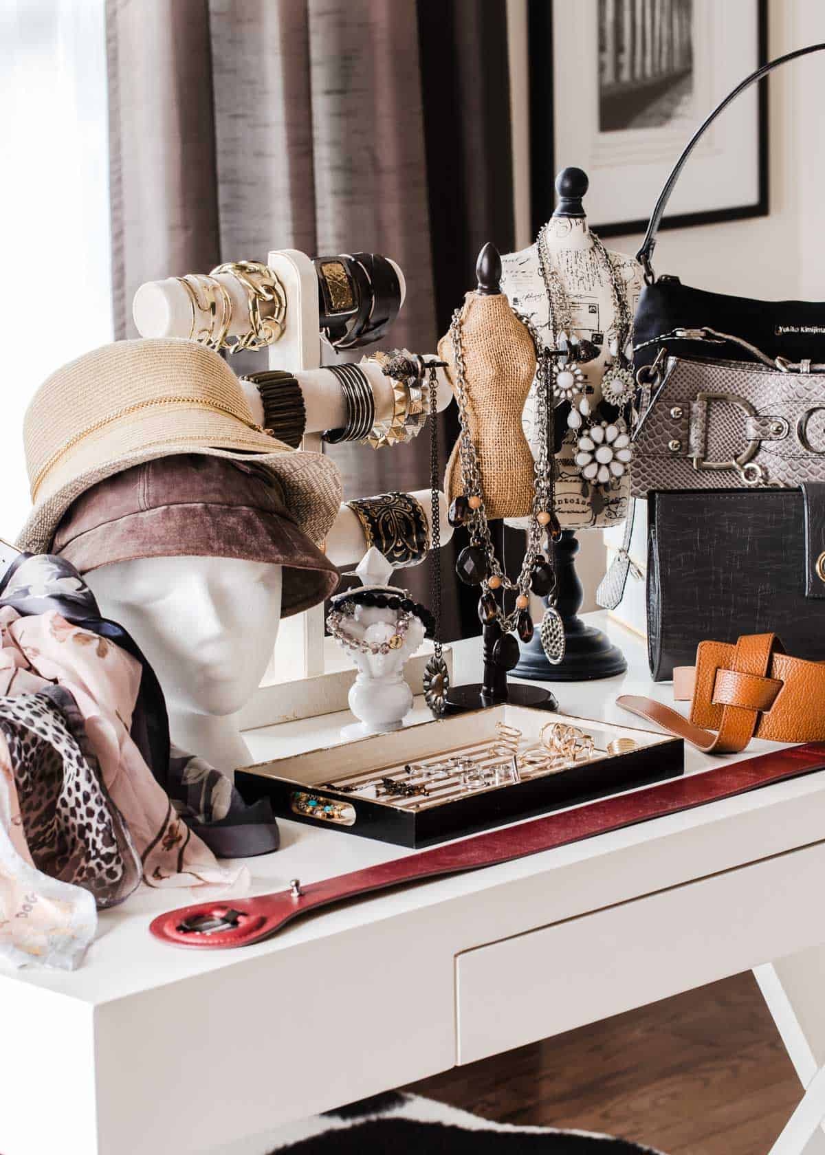 white table set up with fashion accessories for a swap party.