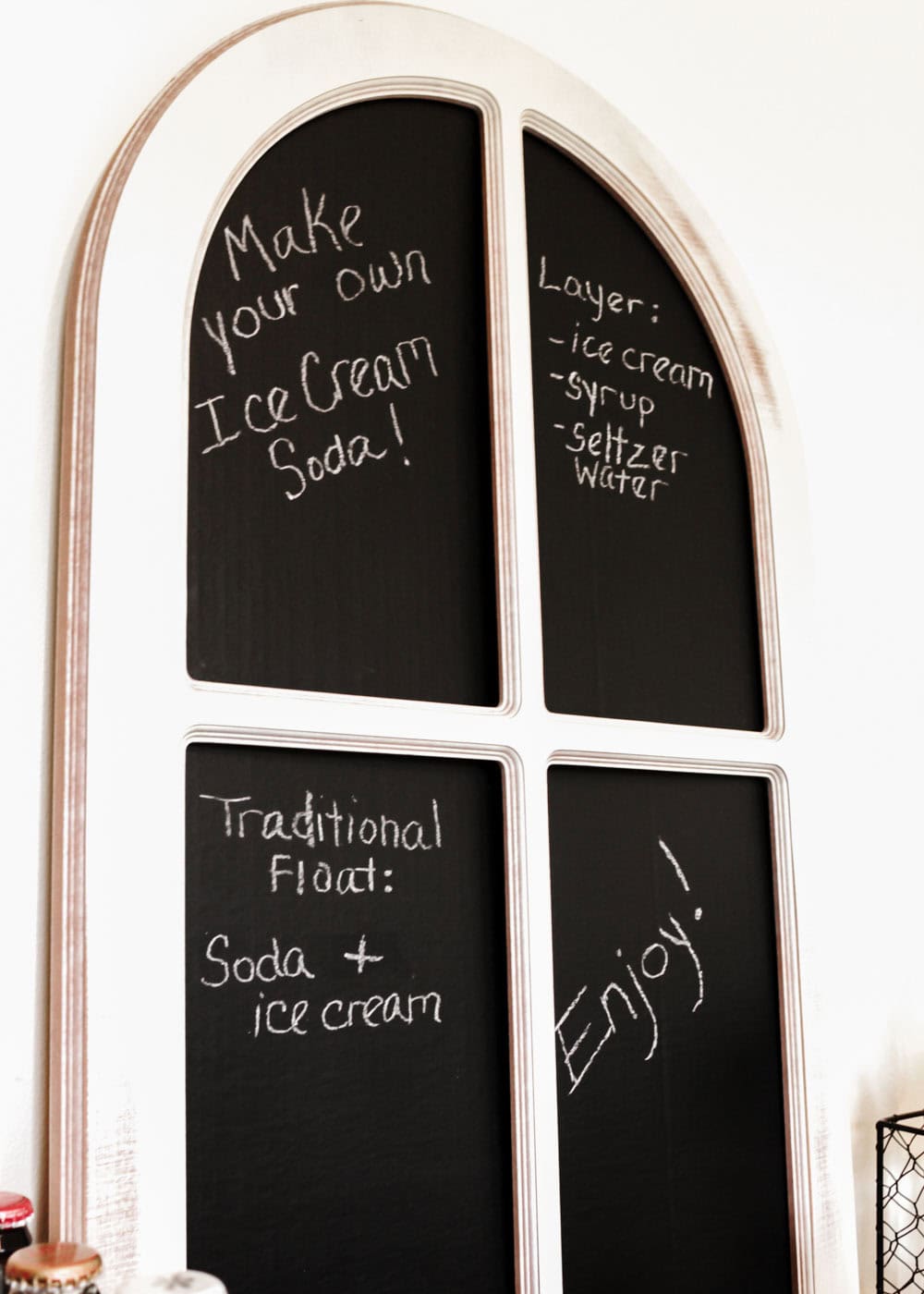 chalkboard sign with directions for making ice cream sodas.