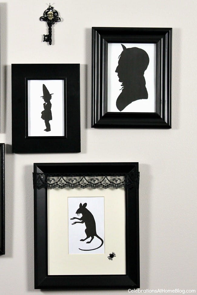 Hang a Halloween framed silhouette wall for spooky decor in your entry hall or party space. This diy gallery wall has a spooky twist.