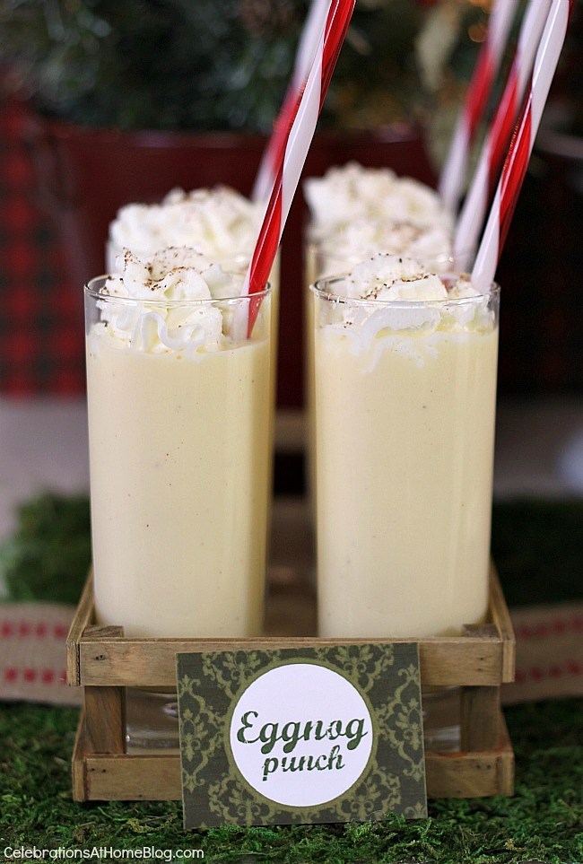 eggnog punch recipe in tall glasses topped with whipped cream