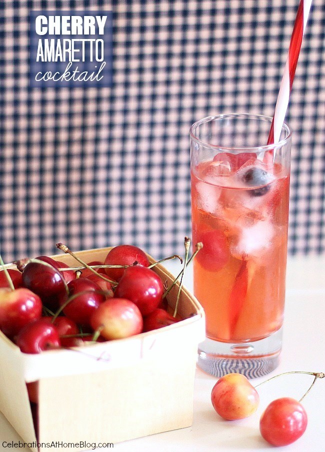 Cherry Amaretto Cocktail with basket of cherries
