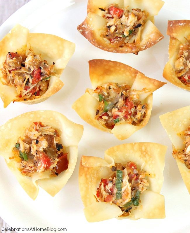 A favorite party appetizer, spicy chicken cups, combine the smoky flavor of chipotle with chicken and cheese for a delightful bite-sized treat.