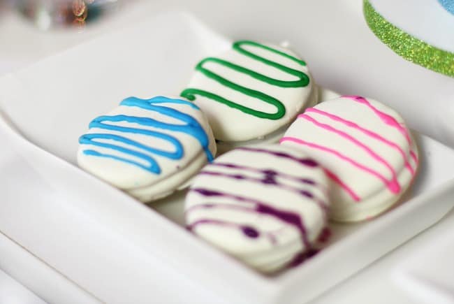 decorated oreos on bright & glittery holiday party