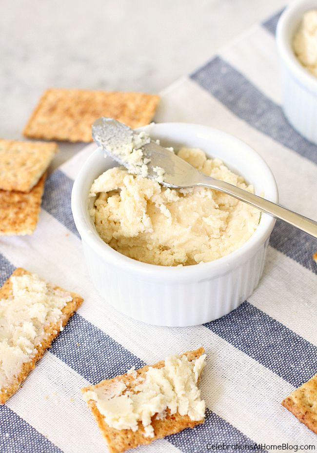 beer cheese spread in white ramekin with club crackers
