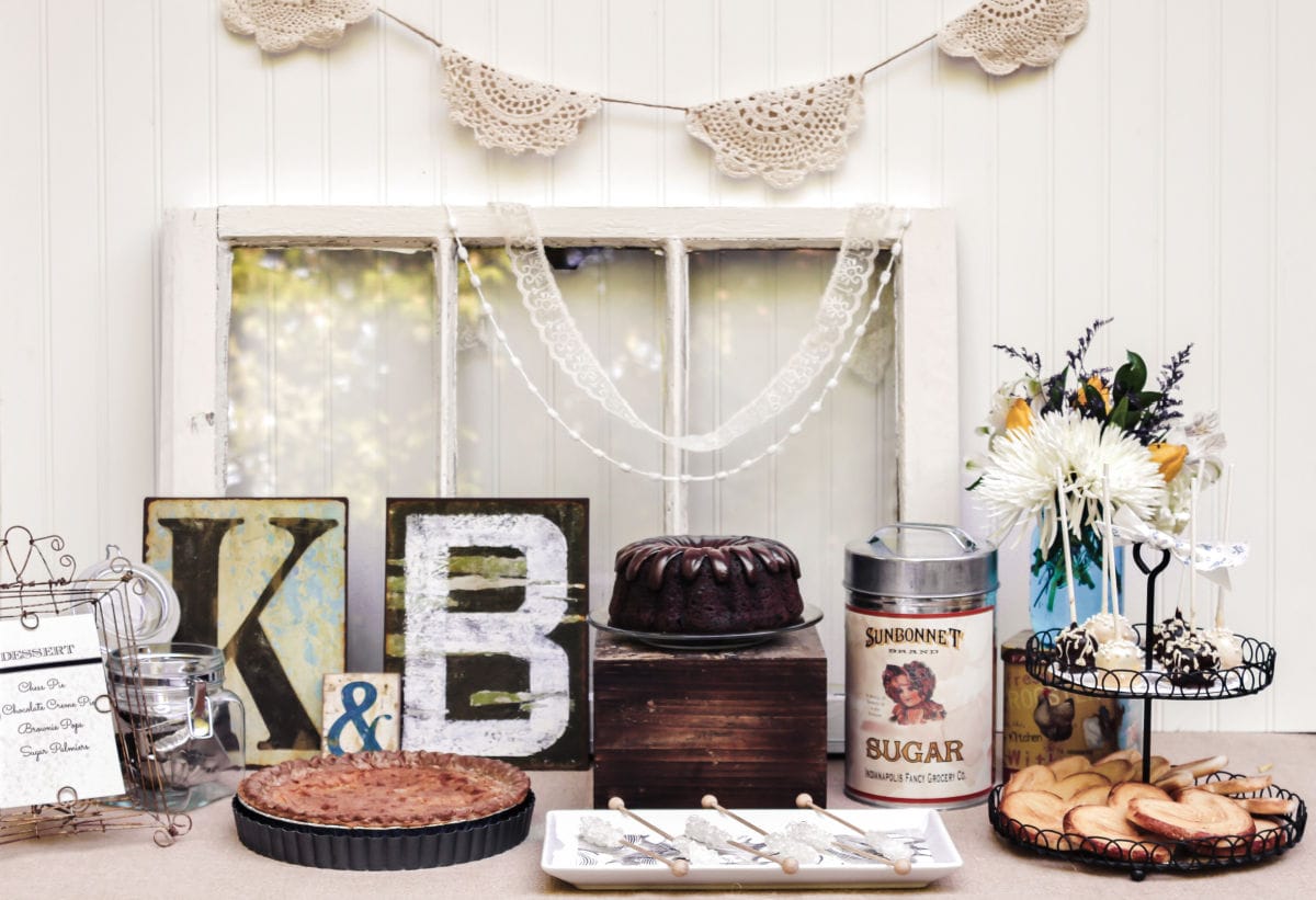 dessert table with vintage decorations.