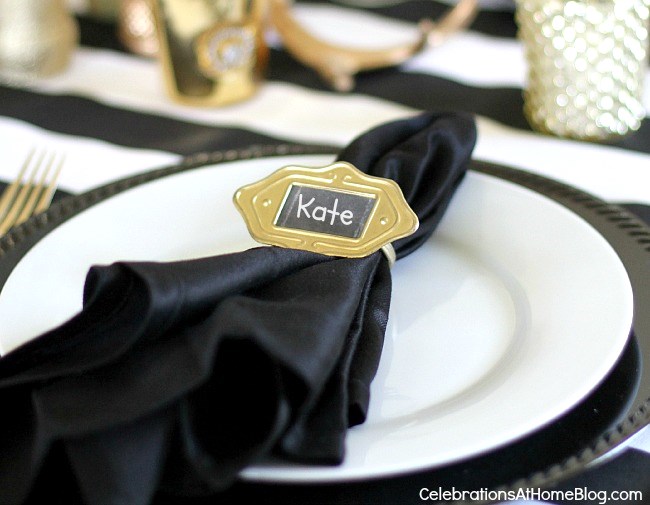 black and white and gold place setting