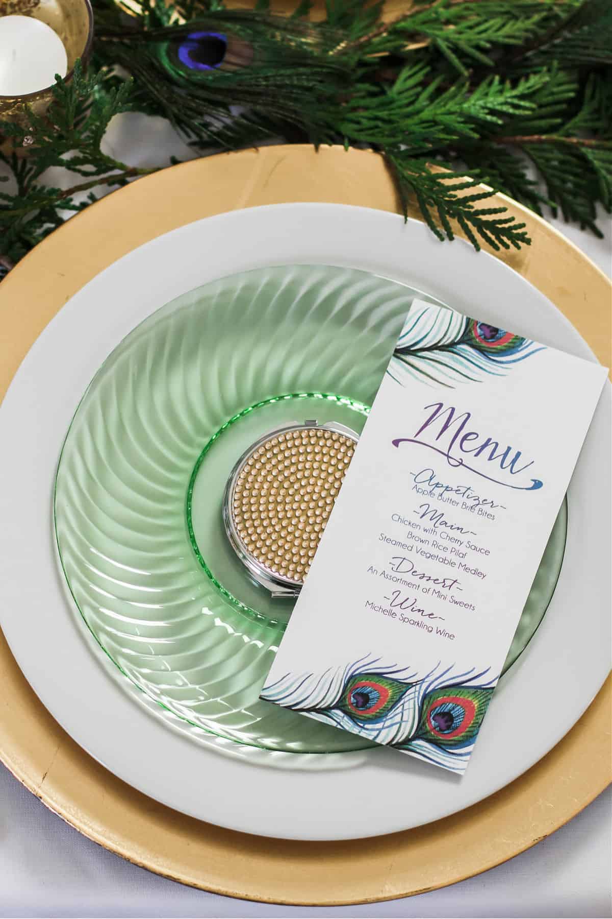 gold charger, white dinner plater, green dessert plate with printed menu on top