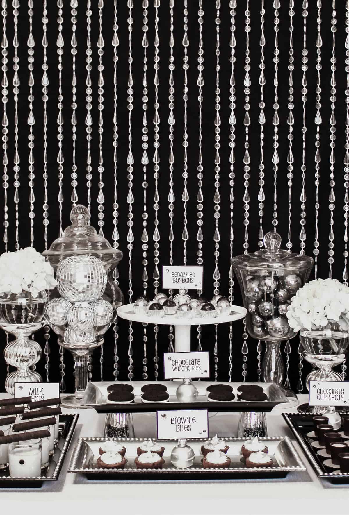 black and silver dessert table