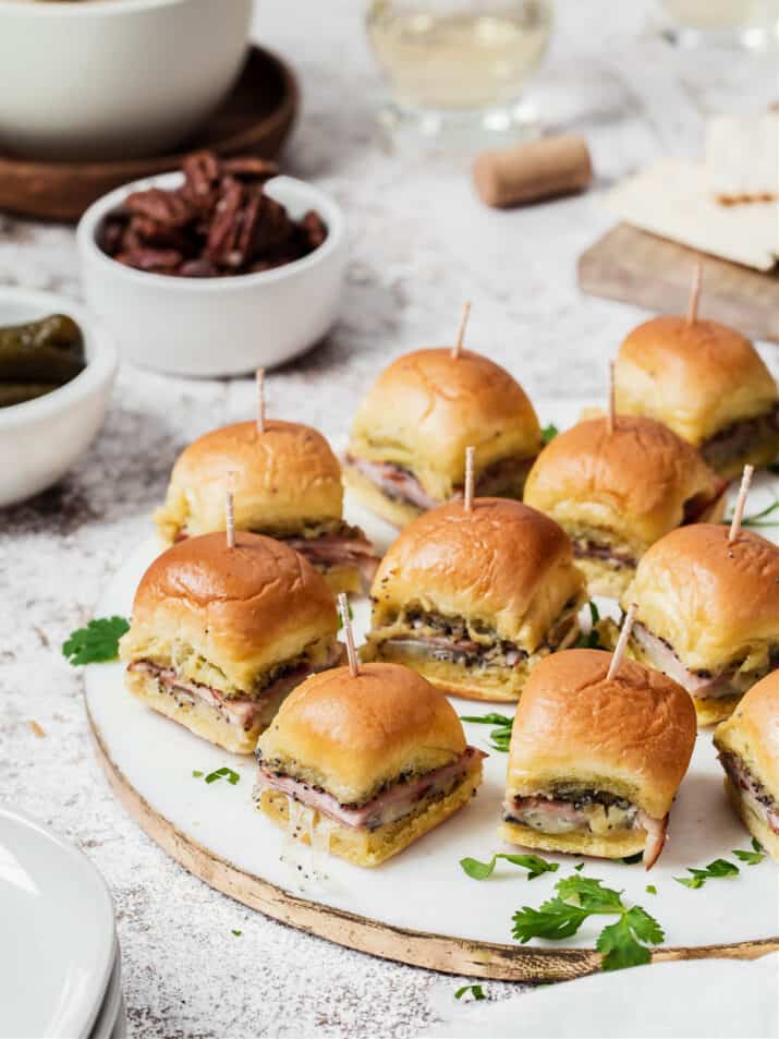 small party sandwiches on white tray