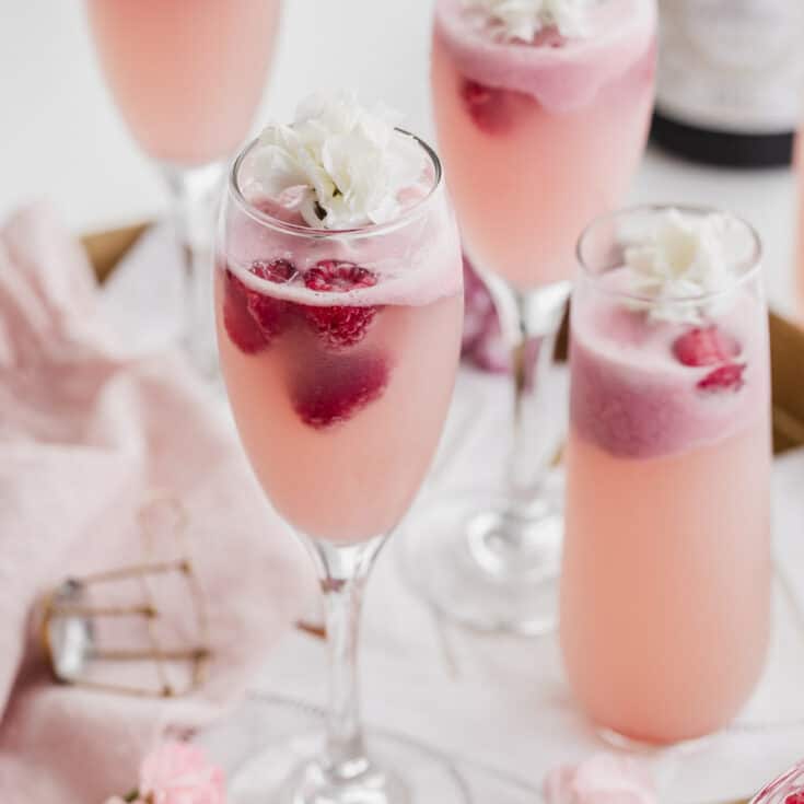 Sparkling Raspberry Champoagne Raspberry Champagne Cocktail - Celebrations at Home