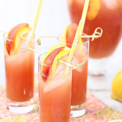 This pomegranate peach lemonade is full of fruity flavor and delicious to serve all summer long.