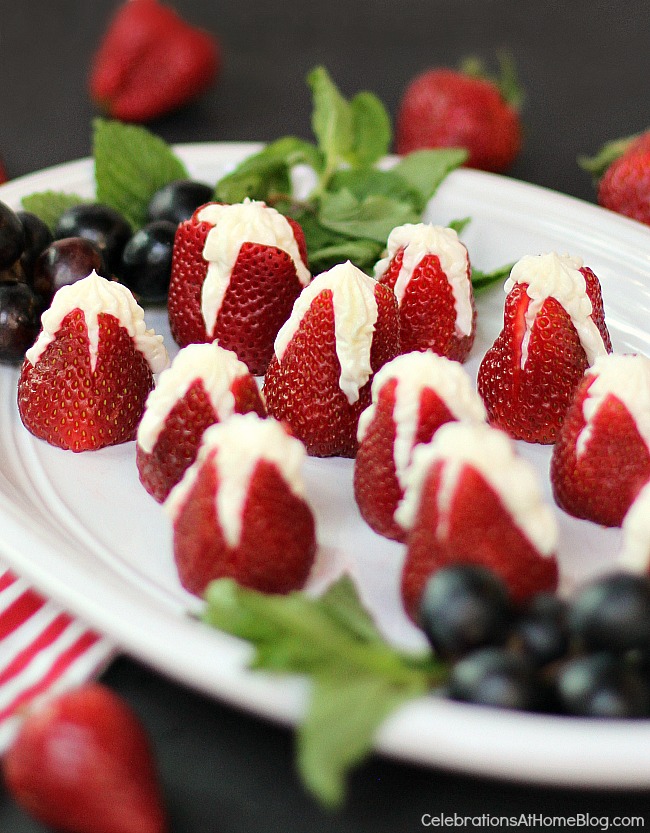 stuffed strawberries and cream on white plate