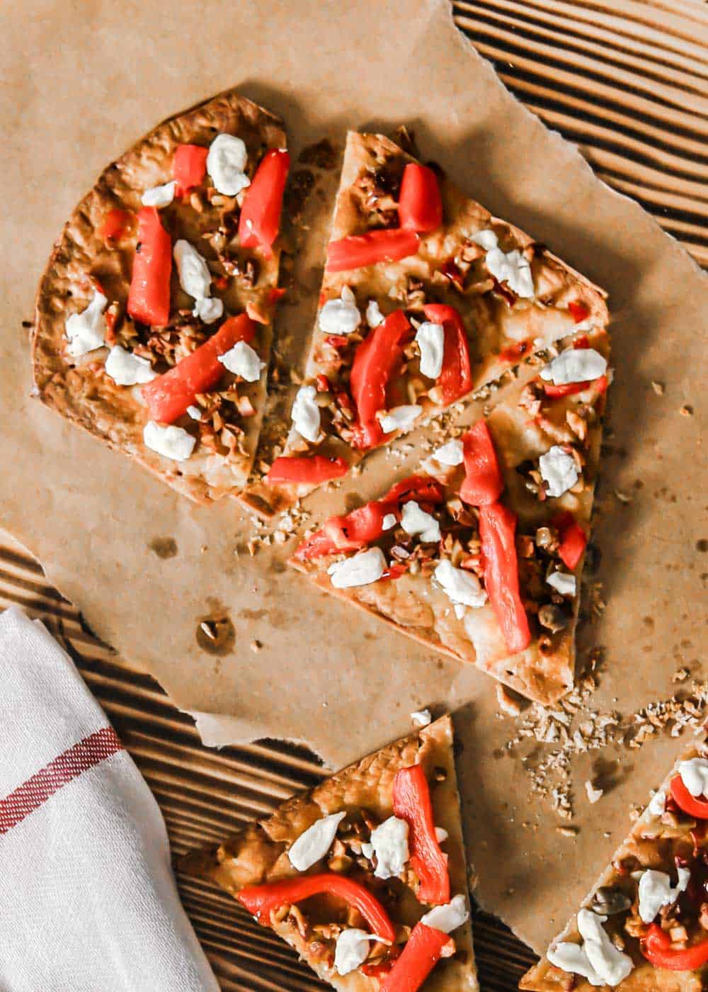 thin crust pizza with olive tapenade, red peppers and goat cheese.