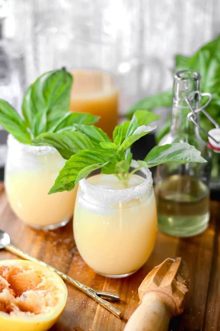 cocktail with basil garnish