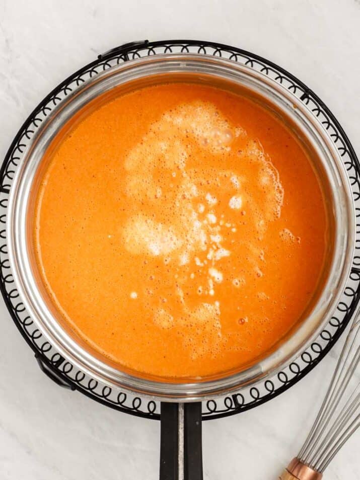 red sauce with cream added, in a skillet.