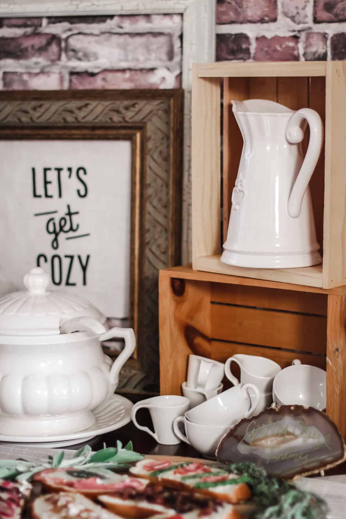 wood crates with white tea cups and pitcher