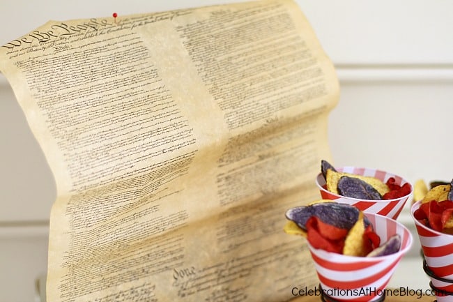 Celebrate the 4th of July with a red white & blue party! Add party decor with a copy of the Constitution. #4thofjuly #july4th #summerparty #theConstitution the Constitution