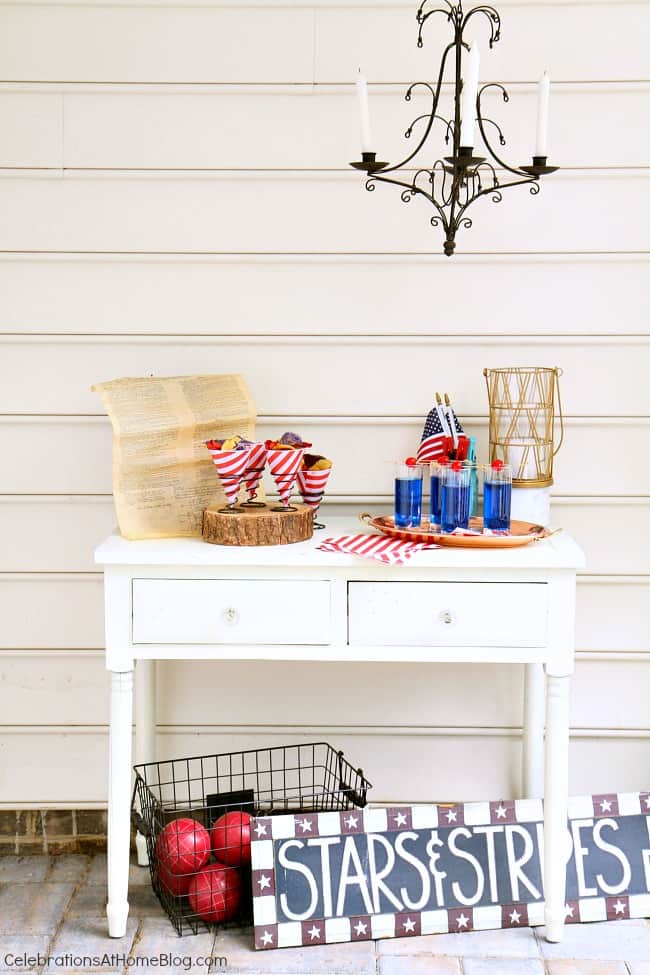 Celebrate the 4th of July with a red white & blue party! Set up a July 4th bar with a blue cocktail. see more here. #4thofjuly #july4th #summerparty #bar 4th of July party bar