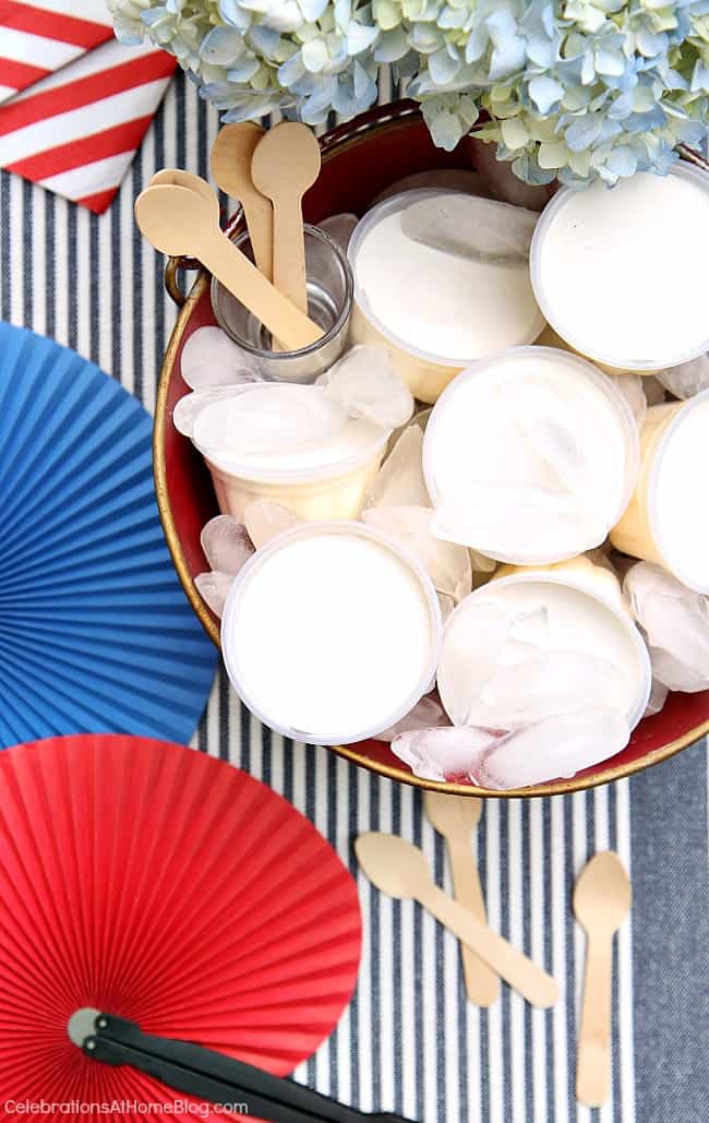 Celebrate the 4th of July with a red white & blue party! Get inspired with these photos and tips from entertaining expert, Chris Nease of Celebrations At Home. #july4th #4thofjuly #summervibes #icecream ice cream cups in ice bucket