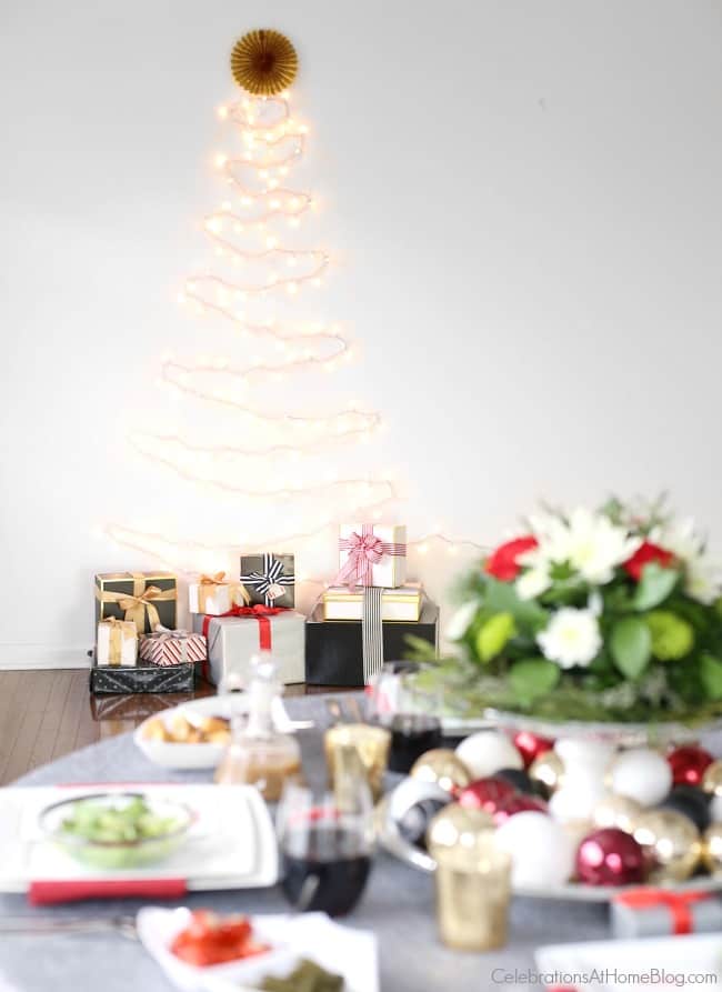 Get Christmas dinner entertaining tips from party stylist Chris Nease, to help you set a chic table for all those extra guests. Holiday entertaining; Christmas tablescape; Christmas bar cart ideas.