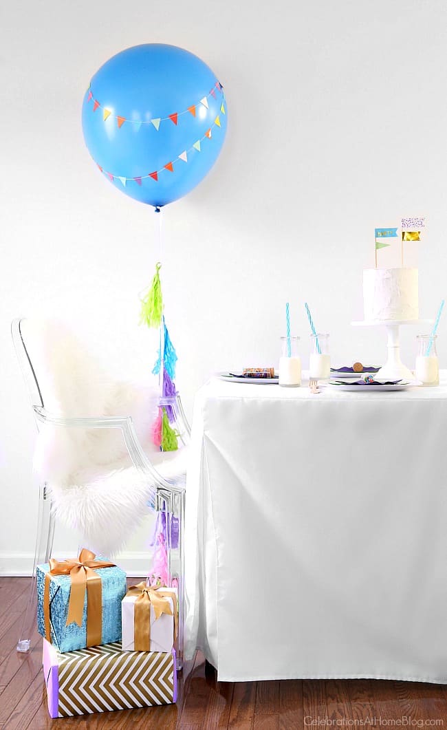 Make this diy party balloon with mini banner for your next party. It's the perfect accent to add for any celebration! balloon decor