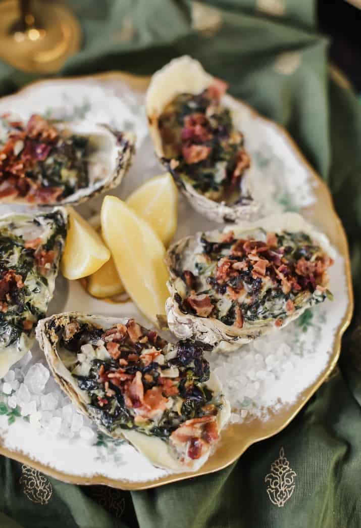 oysters rockefeller on vintage oyster plate
