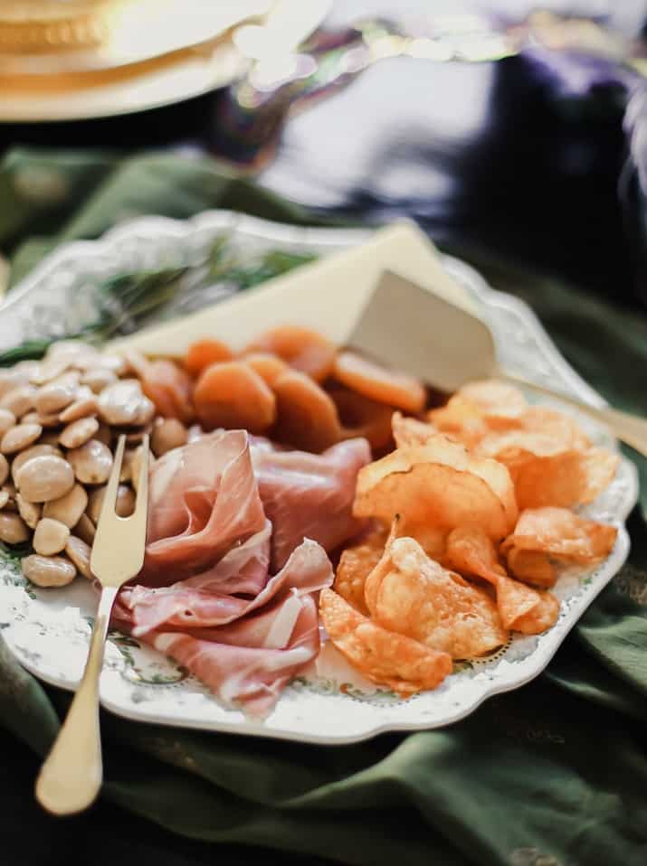 small cheese and charcuterie on vintage platter