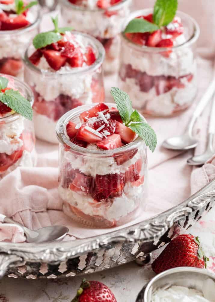 silver tray of min jars filled with strawberry shortcakes.