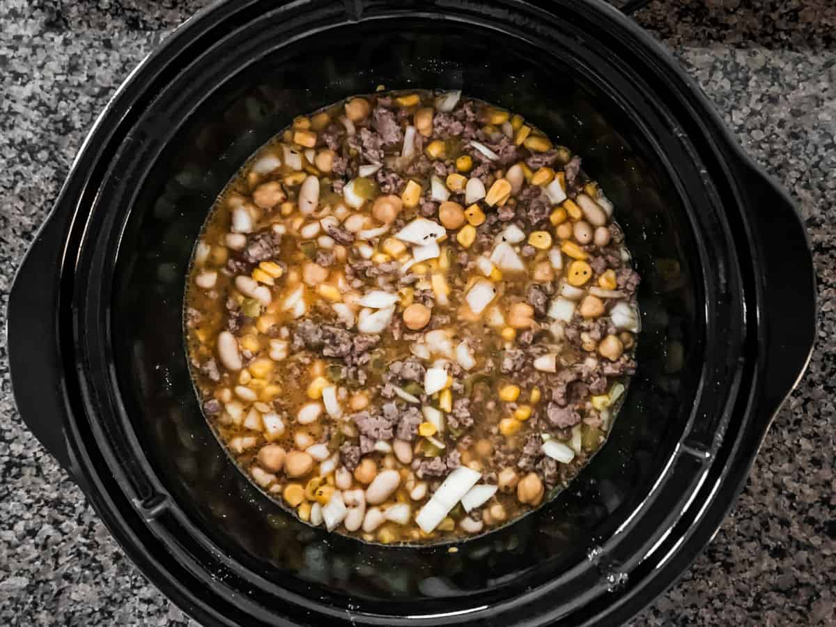 white chili ingredients in a slow cooker.