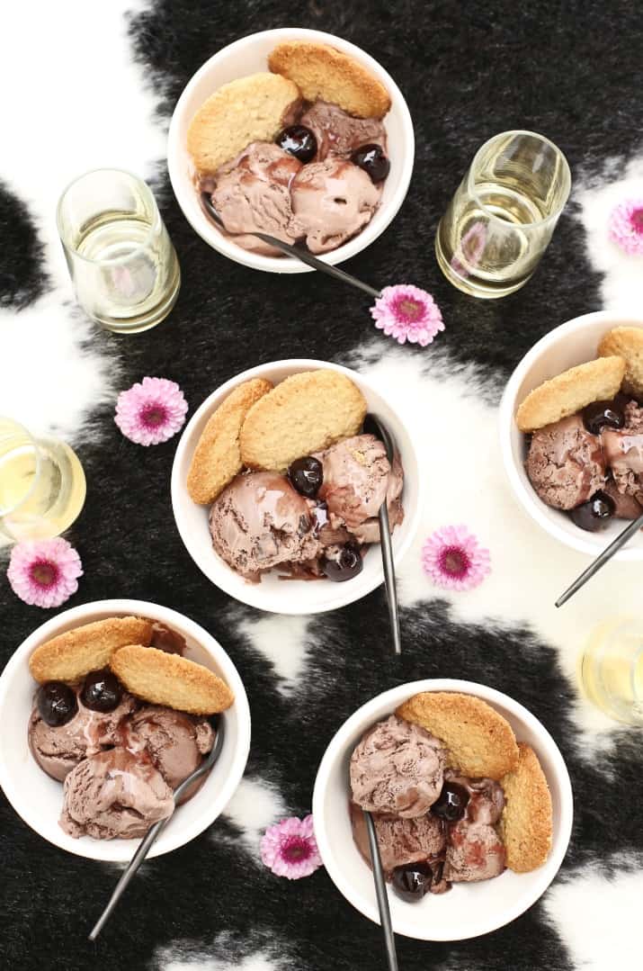 chocolate ice cream with cookies in white bowl 