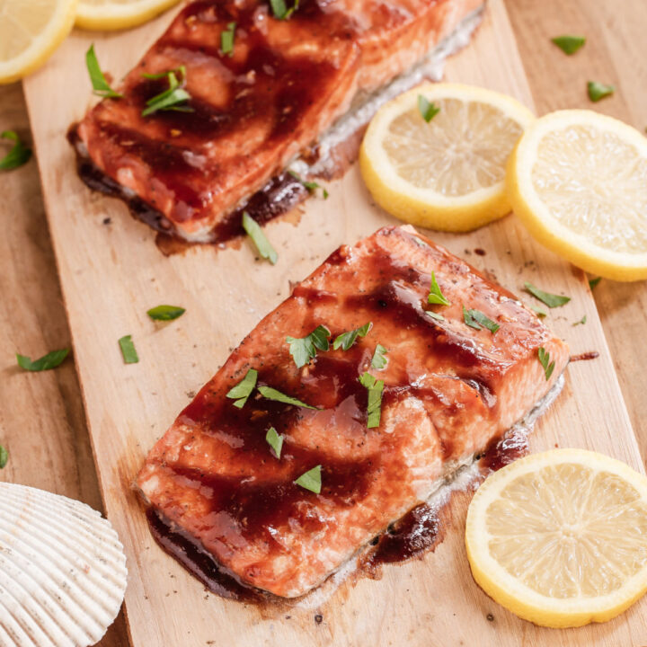 cooked salmon with bbq sauce recipe on cedar plank.