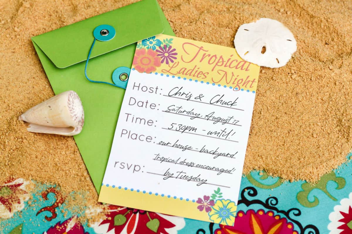 fill in the blank Tropical party invitation, laying on sand with shells.