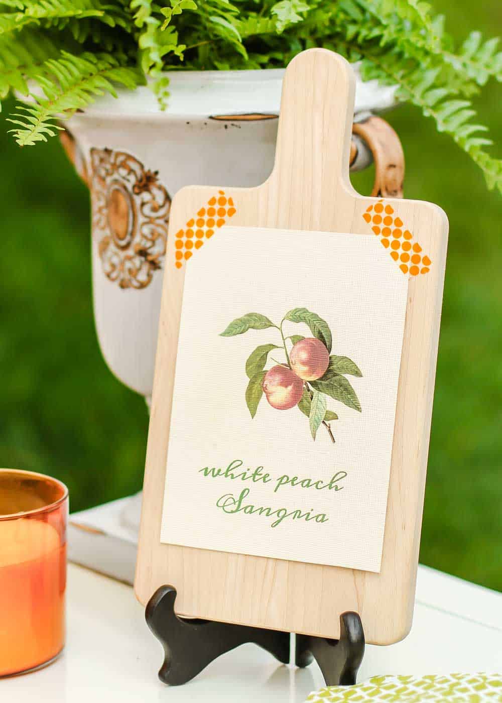 printed sign for peach sangria, on frame stand.