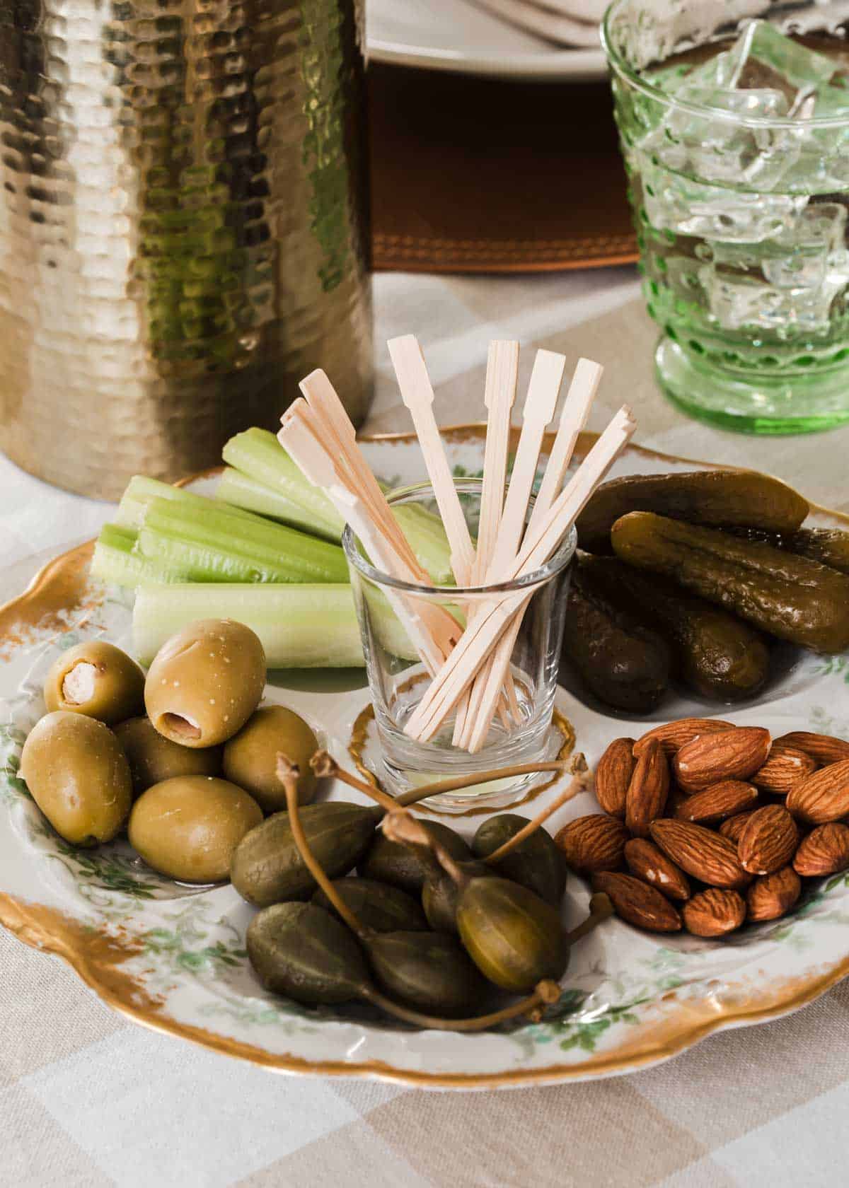 relish plate with pickles, olives, nuts and celery.