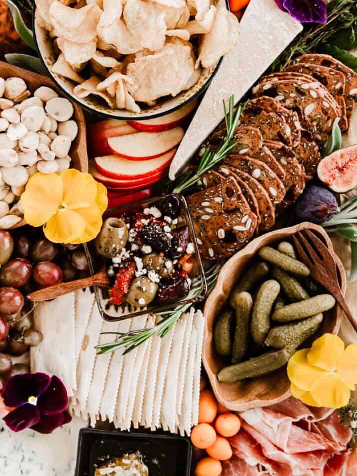two different kinds of crackers on charcuterie board.