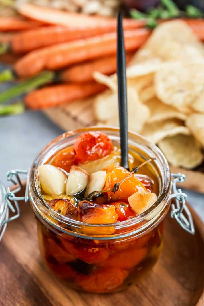 tomato confit in jar with spoon