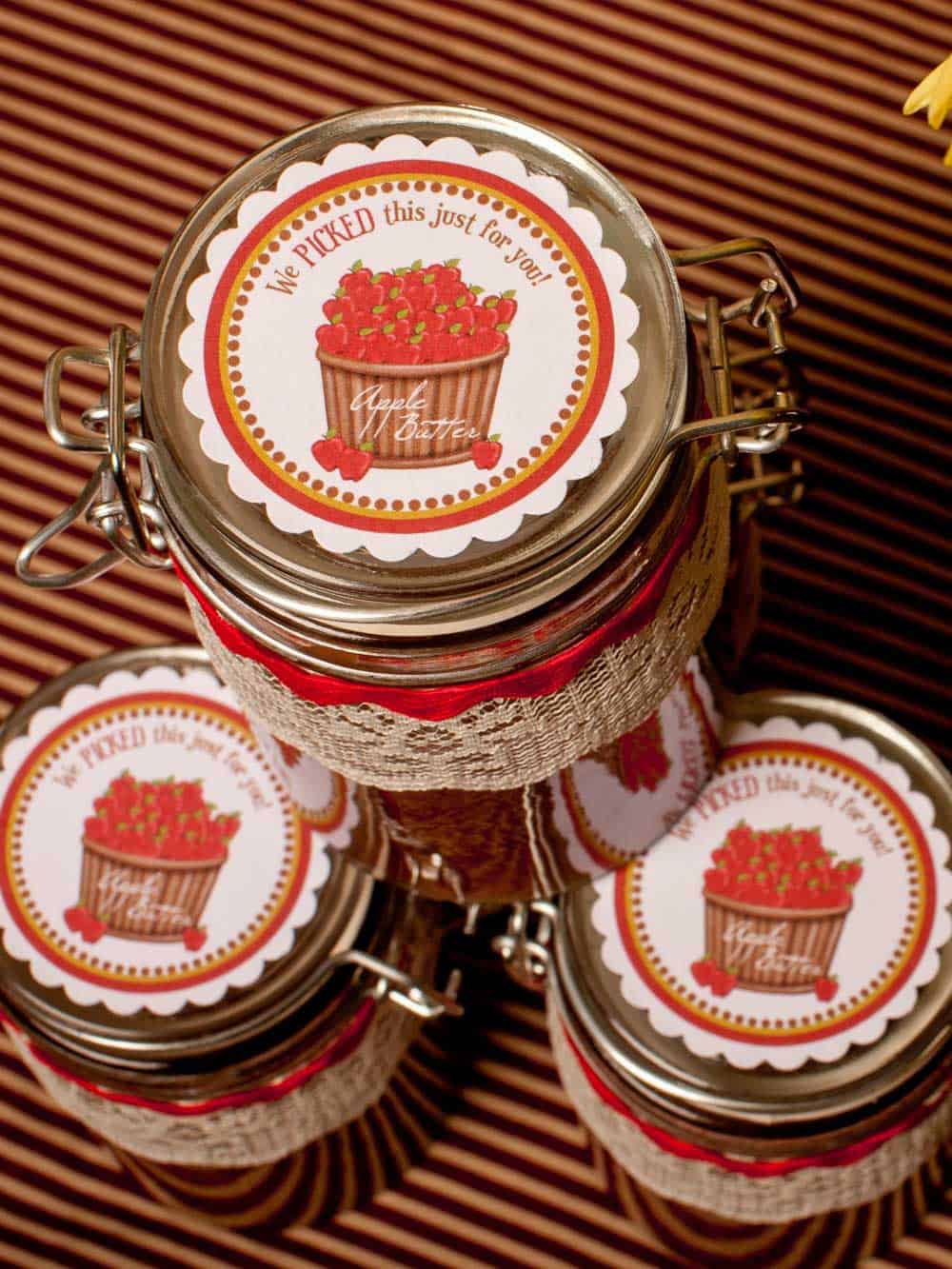 small jars or apple butter with themed labels attached.