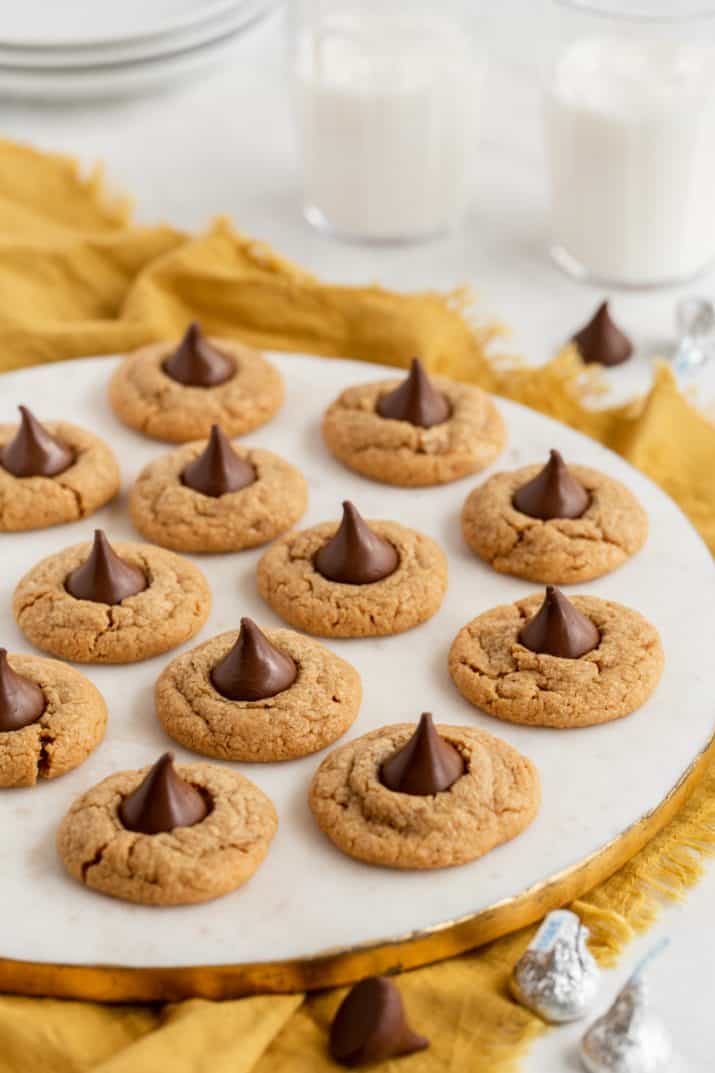 cookies with Hershey's kisses in the center, on round tray.