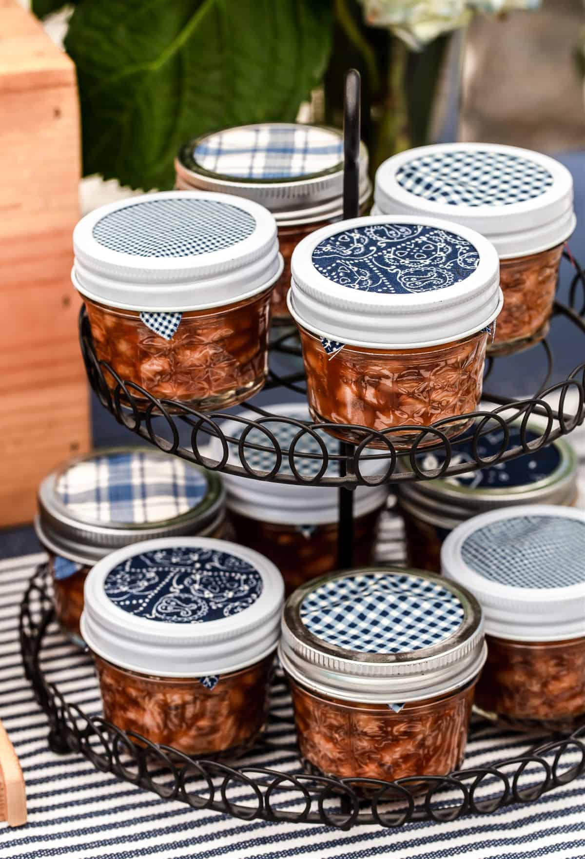 baked beans in small jars, on wire rack
