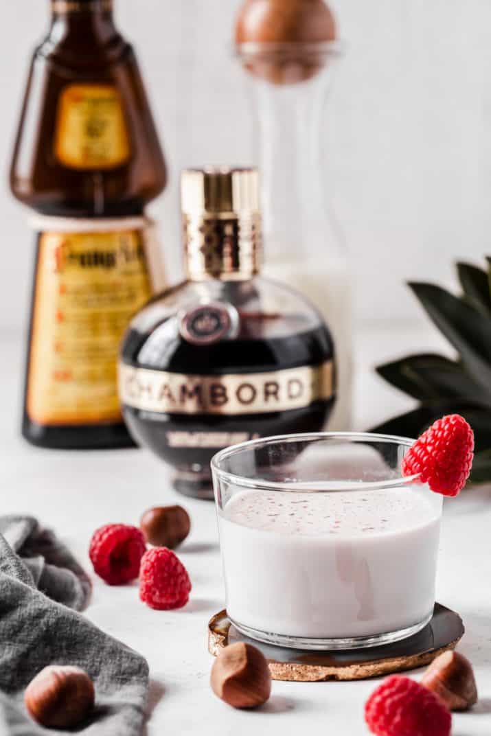 creamy drink with bottles of Frangelico and Chambord