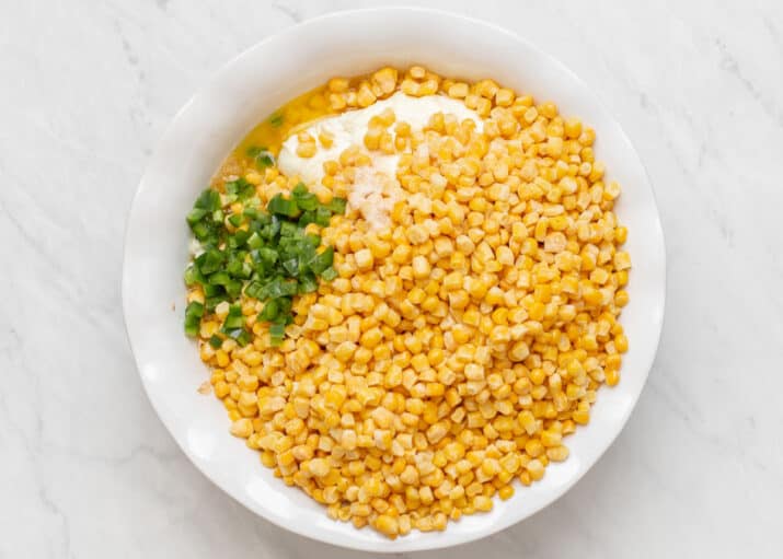 corn and jalapeno added to white dish.