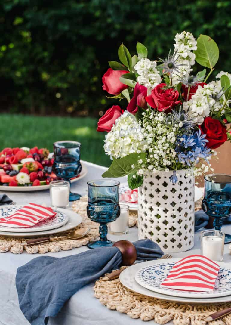 red and blue summer tablescape outside.