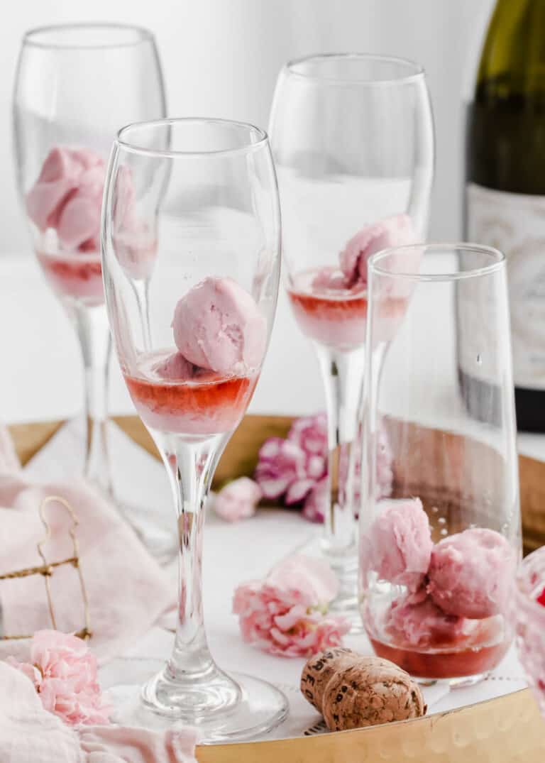Sparkling Raspberry Champoagne Raspberry Champagne Cocktail - Celebrations at Home