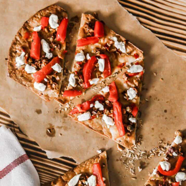 thin crust pizza with olive tapenade, red peppers and goat cheese.